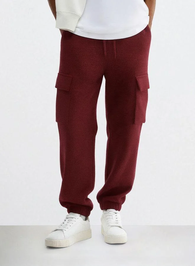 The Indian Garage Co Men Loose Fit Solid Cargo Pocket Mid-Rise Joggers